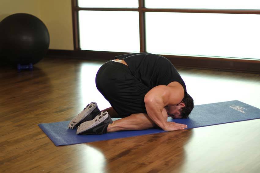 Child's Pose — 3 x 45 s, spine and lat decompression - end position